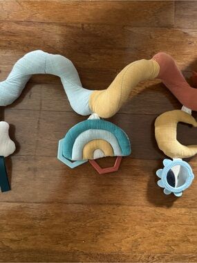 Itzy Ritzy Spiral Activity Toy with Blue, Teal, Yellow, Rust Accents